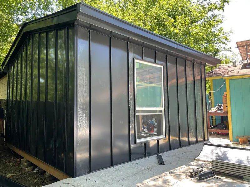 Black standing seam metal wall panels for Roof Inspection in Tipp City