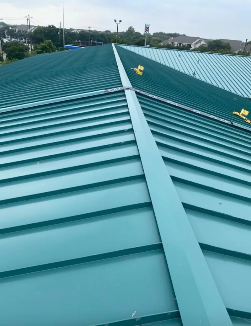 Green commercial metal roof ridge and valley for Metal Roof Repair in Tipp City